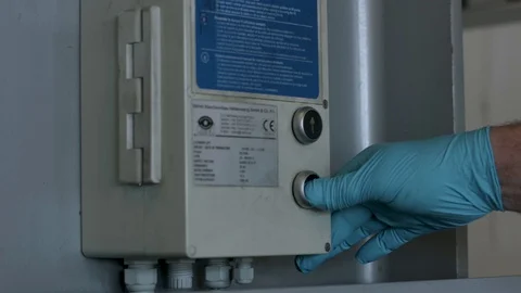 Close up of factory worker pushing a factory machinery button. Industrial setup Stock Footage 101509375