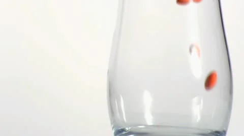 Close-up of falling candies in super slow motion Stock Footage