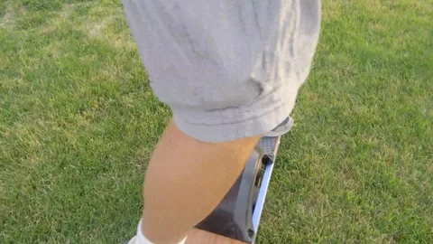 Close up of Falling Off a OneWheel Stock Footage 97650980