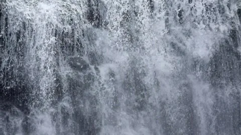 Close up of fast flowing waterfall in the mountains Stock-Footage 297633447