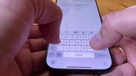 Close-Up on Fast Typing Text Message Mobile Phone Stock Footage 311937475