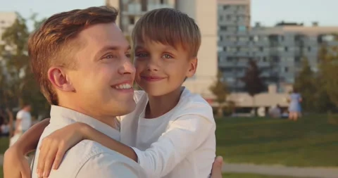 Close-up of a father holding his son in his arms Stock-Footage 161007495