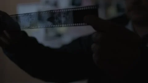 Close up of FBI agent looking at 35mm Film Stock Footage 312455544