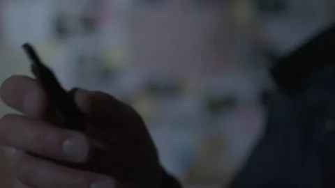 Close up of FBI agent looking at USB drive 스톡 동영상 312455482