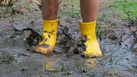 Close-up of the feet of a happy little g... | Stock Video | Pond5