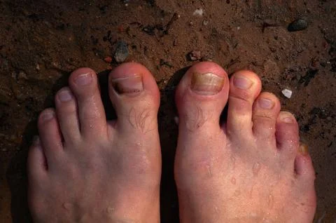 Close-up of the feet of a man Stock Photos