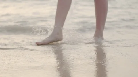 Close up of feet in an ocean Stock Footage 108538822