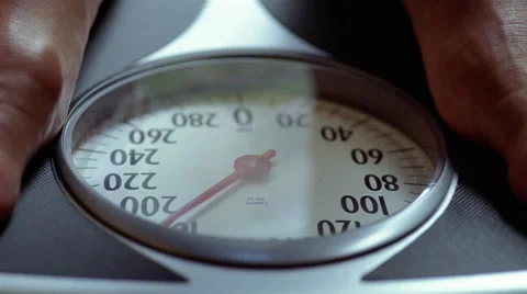 Close up of feet on weight scale Stock-Footage 46216147