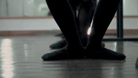 Close-up feets of dancer in black tutu are moving. Video stock 113529586