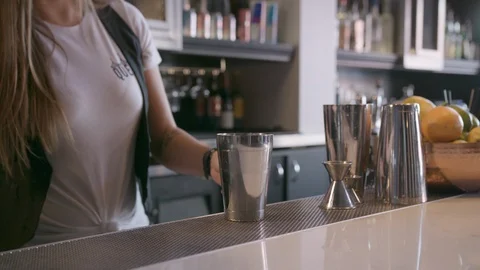 Close Up Female Bartender Using Jigger for Cocktail in Slow Motion Stock Footage 93156839