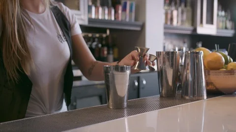 Close Up Female Bartender Using Jigger for Cocktail in Slow Motion Stock Footage 93156846