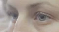 close-up of female blue eyes - macro HD Footage