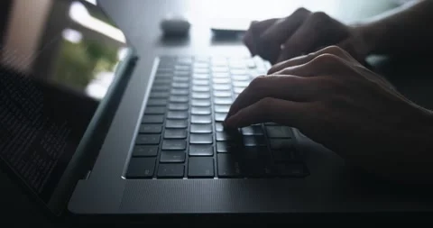 Close up female computer Hacker typing programmer code virus on laptop computer Stock Footage 245272323