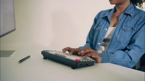 Close-Up of Female Developer Typing on Mechanical Keyboard in Tech Office. Stock Footage 307587094
