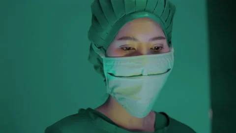 Close-up of a female doctor's face in the operating room Stock-Footage 189389829