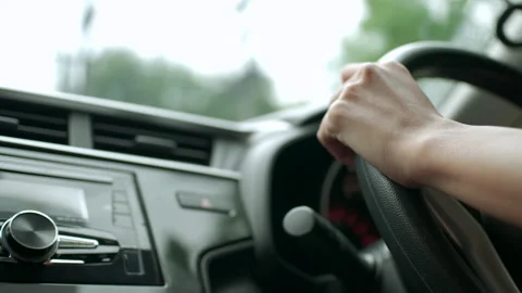 Close-up of female driver's hands on steering wheel Stock Footage 346510188