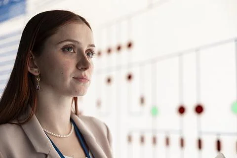 Close up of female engineer inspecting PCB components blueprint on screen Stock Photos