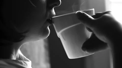 Close up of female face drinking coffee from white cup Stock Footage 58691588