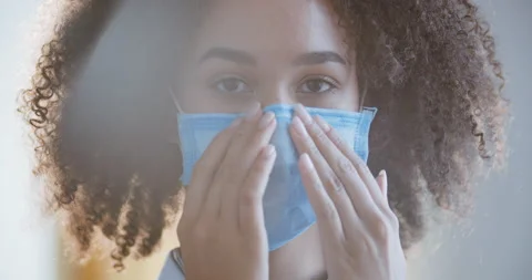 Close up of female face looking at camera. Portrait of african american woman Stock Footage 139824540