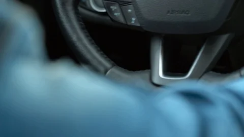 Close up of female finger pressing an engine start stop button in car Stock Footage 95845780
