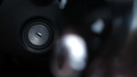 Close-up. Female hand includes ignition, refocus, buttons light up 4K Slow Mo Stock Footage 100398811