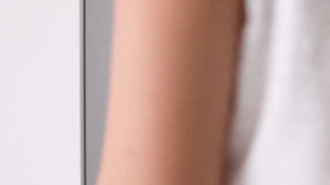 Close up female hand opens white wooden door in white room. Stock Footage 255590656