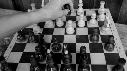 Close-up of a female hand playing chess for development strategy analysis Stock Footage 206820455