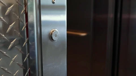 Close up on female hand pressing elevator button, doors and entering with Video stock 314090532