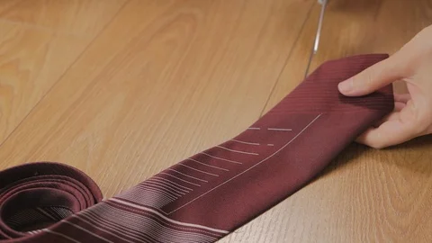 Close-up of female hand scissors cut and destroy male ties Stock Footage 92641762