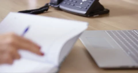 Close Up Of Female Hand Taking Notes Stock Footage 142930581