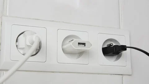 Close-up of a female hand unplugging one USB cable and connecting another cable. 스톡 동영상 339006829