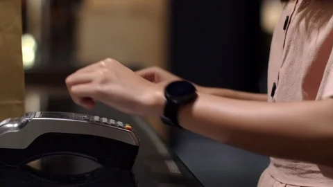 Close up female hand use smart watch contactless payment Stock Footage 115064472