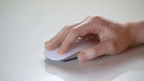 Close-up of female hand using white mouse Stock Footage 71710082