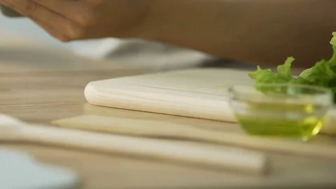 Close-up female hands adding data to phone calculating caloric value of dinner Stock Footage 85278894