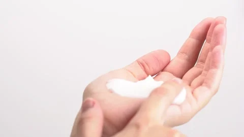 Close up female hands applying moisturizing cream. Skincare cosmetics, trea.. Stock Footage 277631563