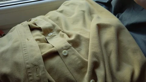 Close up of female hands can't threading into sewing needle. Woman learning to s Stock Footage 137276664