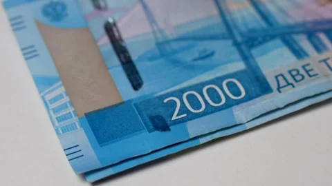 Close-up of female hands counting a stack of Russian ruble money Stock Footage 256215980