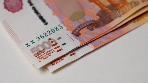 Close-up of female hands counting a stack of Russian ruble money Stock Footage 256216020