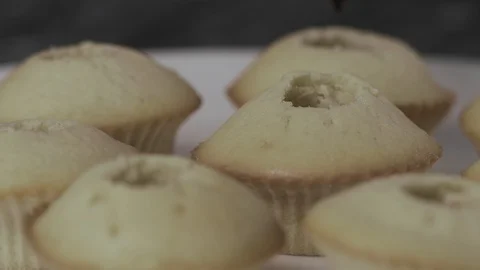 Close-Up, Female Hands Fill with Jam Cupcakes Stock Footage 106597346