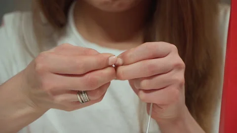 Close-up of female hands making cardboard craft 스톡 동영상 170786232