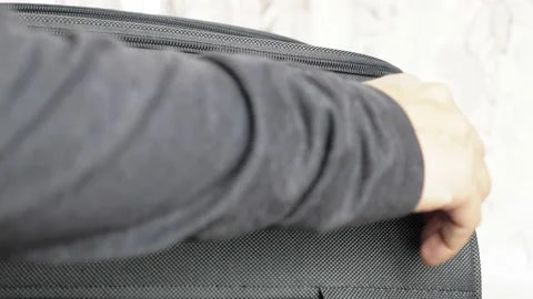 Close-up female hands open the suitcase and fasten it with a lock. The girl Video stock 211781469