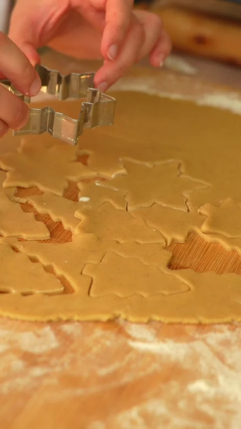 Close-up of female hands preparing gingerbread cookies Stock Footage 294437689
