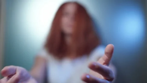 Close-up female hands slowly make a gesture call Stock Footage 161061972
