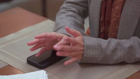 Close-up of female hands on a table during a professional business conversation Stock Footage 294626966