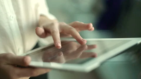 Close-up of female hands touching digital tablet Stock Footage 68631081