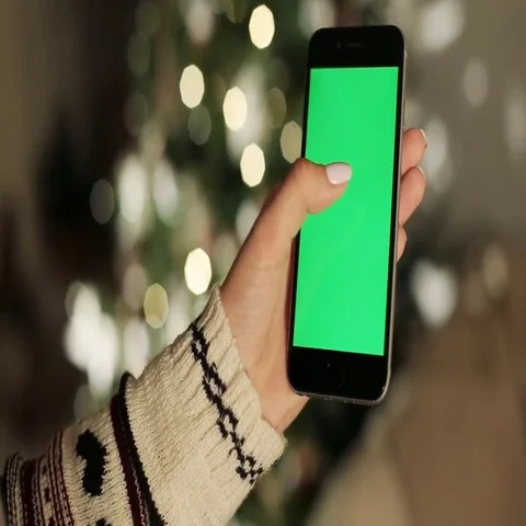 Close-up of female hands touching of smartphone. Green screen Chroma Key. Close Stock Footage 69421571