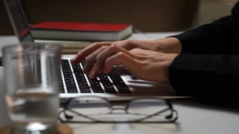 Close up of female hands types on keyboard, woman typing on laptop close view Stock Footage 129430604