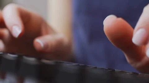 Close up of female hands typing on a computer keyboard Stock Footage 334873718