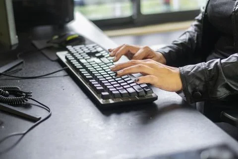 Close up of female hands typing on computer keyboard during online study se.. Stockfoto's
