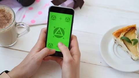 Close Up of Female Hands Typing on The Green Screen Phone. Stock Footage 116613700
